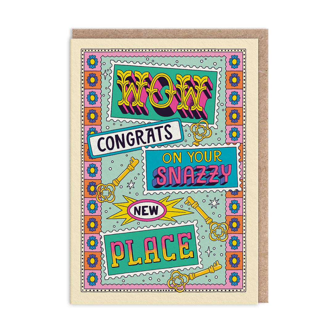 Snazzy new place greeting card on a wooden table